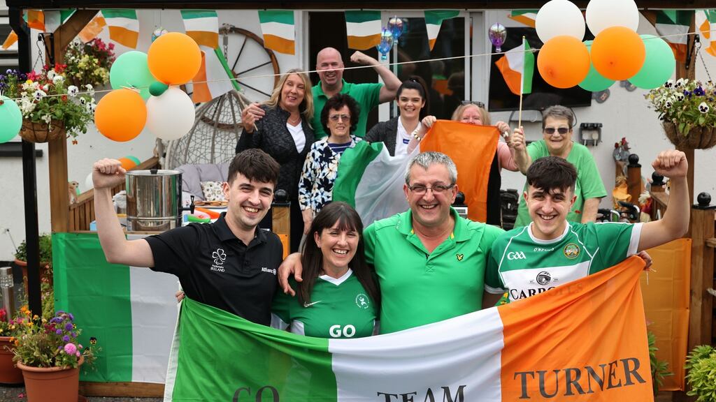 Nicole Turner’s family and friends celebrate the Paralympian’s success at home in Garryhinch, Co Offaly. Photograph: Dara Mac Dónaill