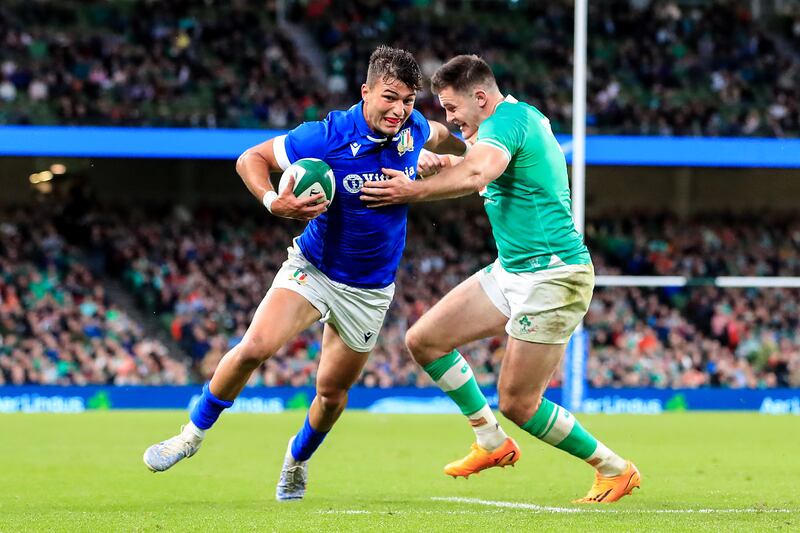 Italy's Lorenzo Pani gets around Ireland's Jacob Stockdale to score a try at the Aviva Stadium. Photograph: Evan Treacy/Inpho