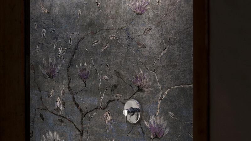 Add a little wallpaper to bring floral pattern into a shower stall setting.