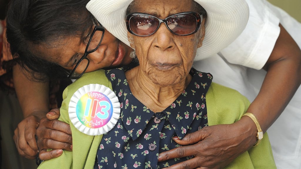 Susannah Mushatt Jones with her niece Lois Judge,72, as they celebrate her 113th birthday with a party at the Vendalia Senior Centre in Brooklyn. Miss Susie was born on July 6th, 1899 in Alabama, the third of eleven children. She died this week aged 116. Photograph: Debbie Egan-Chin/NY Daily News/Getty Images