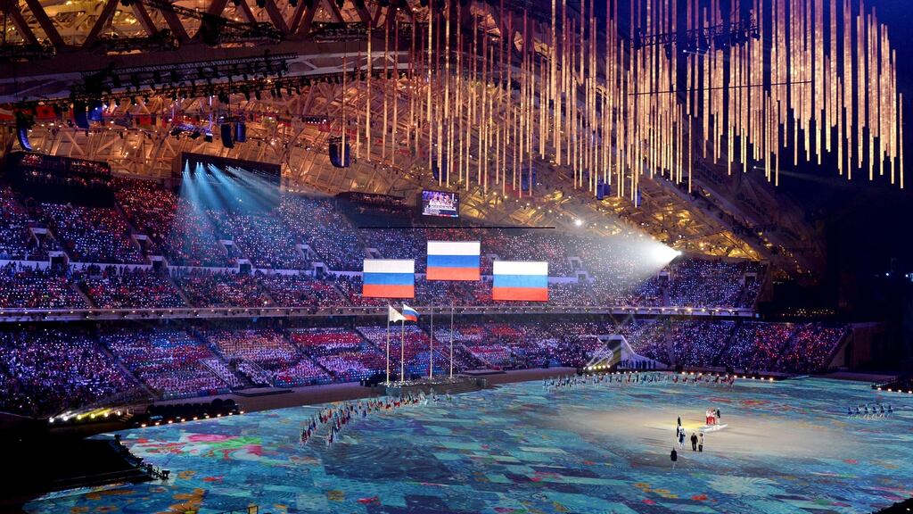 Russian athletes during the podium ceremony after their clean sweep of the men’s crosscountry 50km mass race at the Sochi Winter Olympics in 2014. Photograph: Getty.