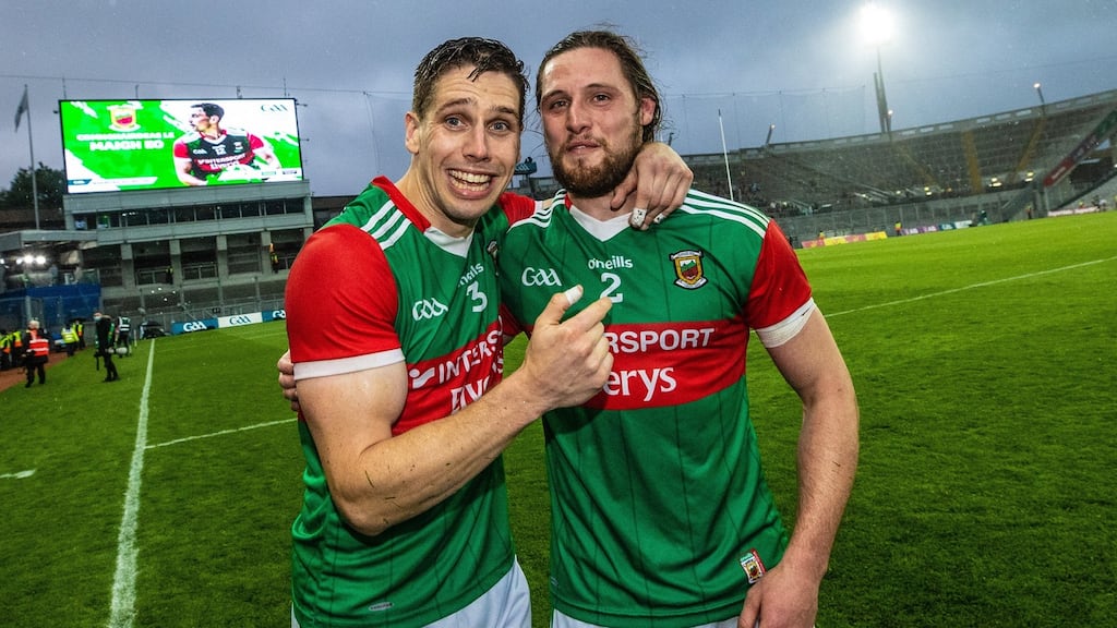 Lee Keegan and Padraig O’Hora celebrate after the game. Photo: James Crombie/Inpho