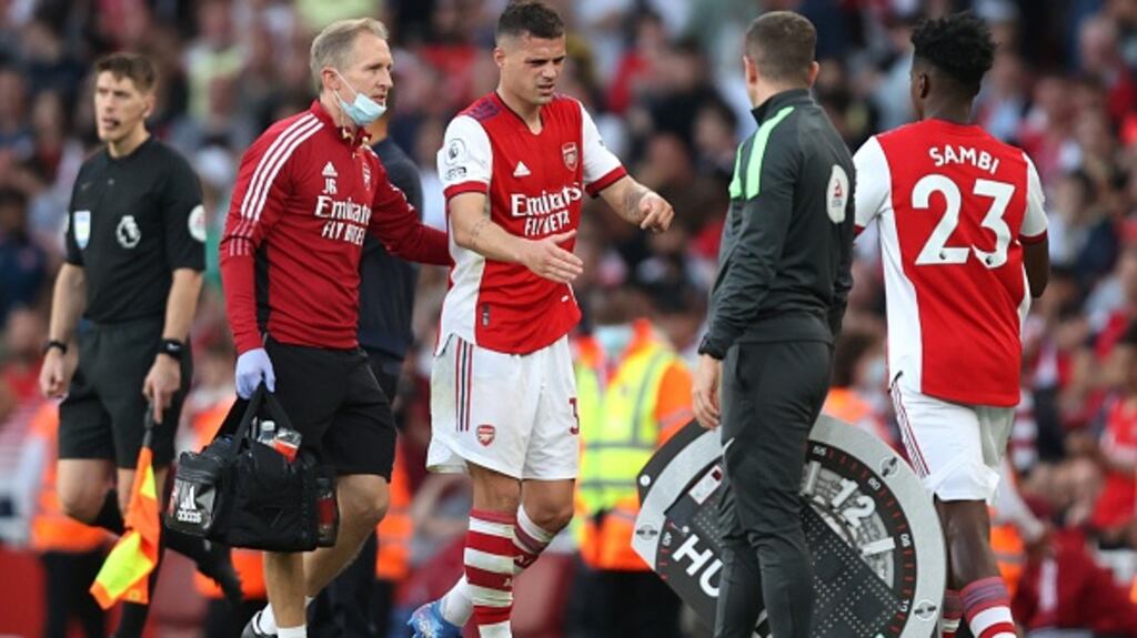 Granit Xhaka limps off during Sunday’s North London derby victory. Photograph: Julian Finney/Getty Images