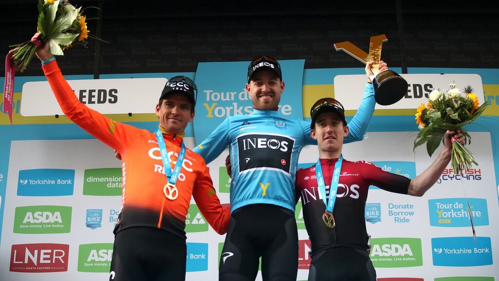 Eddie Dunbar (right) after his podium finish in the Tour de Yorkshire alongside Ineos team-mate Chris Lawless and CCC’s Greg Van Avermaet. Photograph: Bradley Collyer/PA Wire