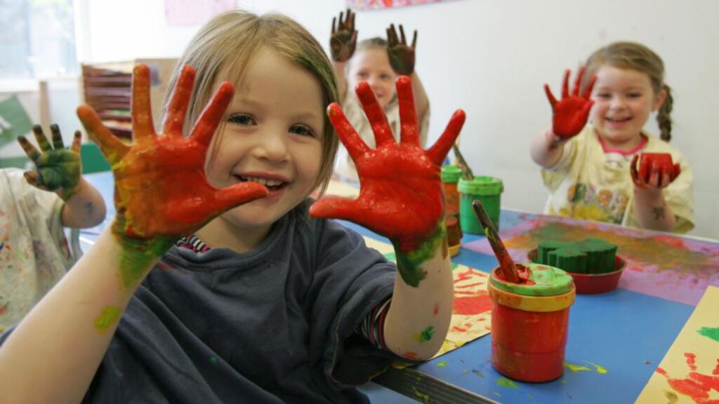 Hands on: childcare and guilt, there’s no avoiding it.
.
. Madison Lawlor in the "Messy Room" during a recent visit by Minister for Children Frances Fitzgerald to the F2 centre in former Fatima Mansions area of Rialto in Dublin. Photograph: Frank Miller