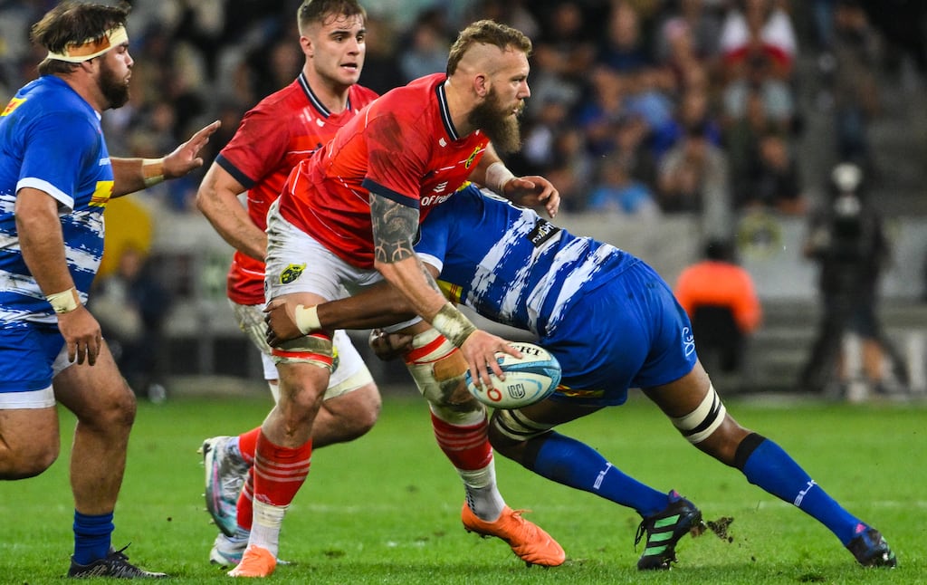 RG Snyman of Munster is tackled against Stormers. Photograph: Thinus Maritz/Steven Haag Sports/Inpho