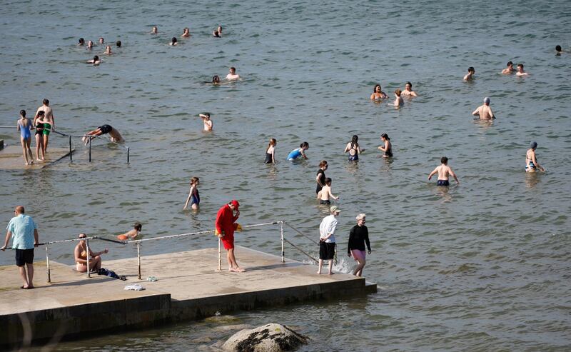 20/06/2025 - News - Swimmers at Seapoint having fun as the afternoon temperatures rose.  Photograph Nick Bradshaw