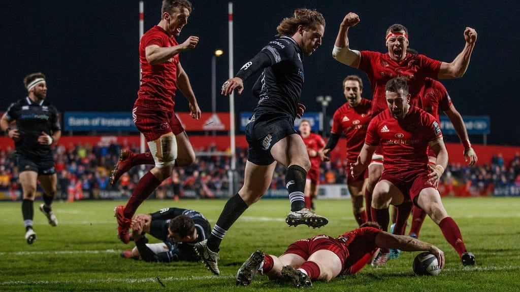 PRO14: Munster’s Darren Sweetnam, Robin Copeland and JJ Hanrahan celebrate after Rory Scannell scored his side’s fourth try against Ospreys. Photograph: James Crombie/Inpho