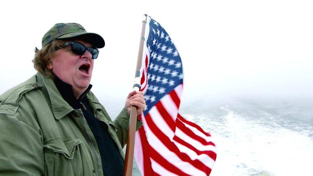 Flying the flag: Michael Moore looks at what policies could be taken home to the US.