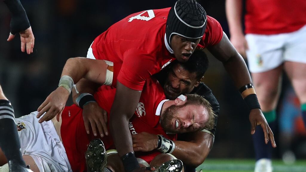 Lions secondrow Alun Wyn Jones takes a blow to the head in a tackle from All Blacks backrow Jerome Kaino during the third Test at Eden Park in Aukland. Photograph: Hannah Peters/Getty Images