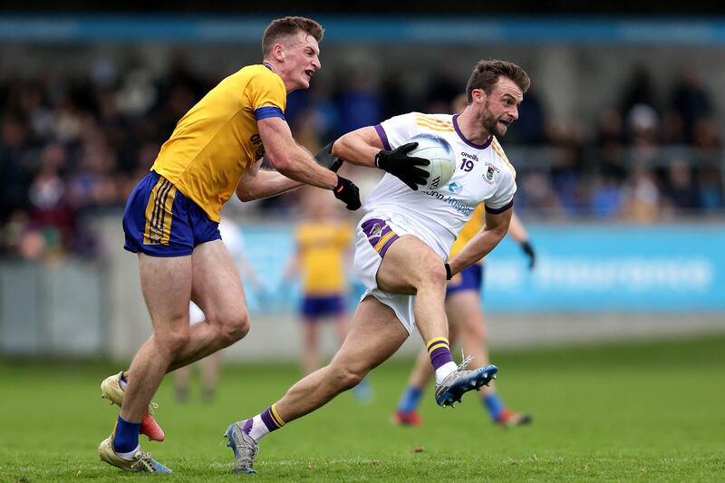 Kilmacud Crokes' Shane Horan and Michael Day of Na Fianna in action during the Dublin SFC final at Parnell Park. Photograph: Laszlo Ceczo/Inpho