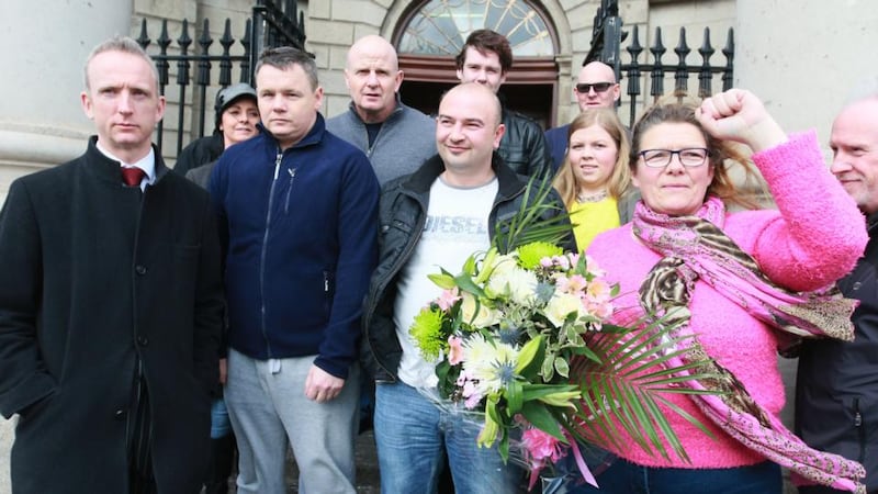 Solicitor Cahir O Higgins (extreme left of pic) with water protesters Paul Moore (navy top), Damien O Neill (grey Top) Derek Byrne (white tshirt) and Bernie Hughes (right) pictured after the four jailed protesters were released. Photograph: Collins