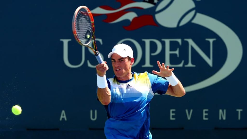 James McGee of Ireland returns a shot against Aleksandr Nedovyesov of Kazakhstan in their first round at the 2014 US Open. Photograph: Elsa/Getty Images