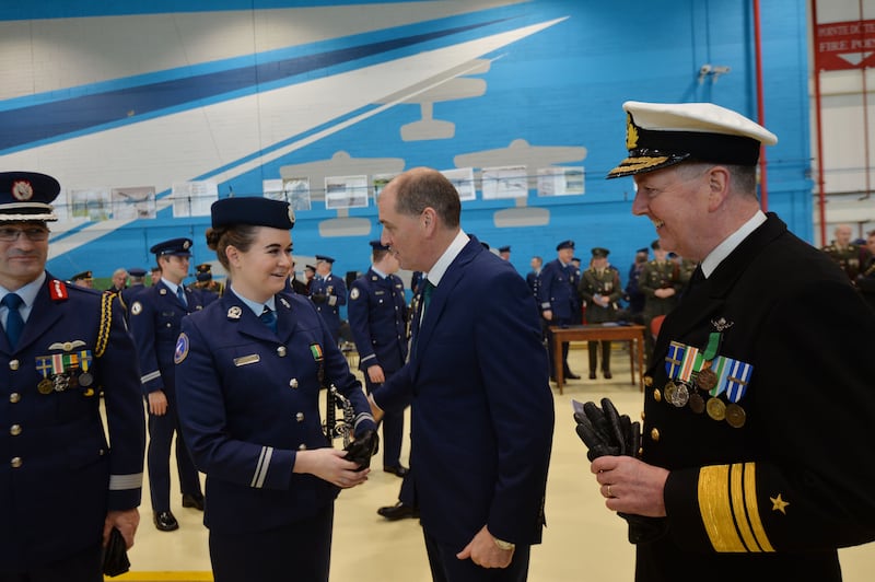 Paul Kehoe, the then minister for defence, congratulates Lauren Cusack after the 35th Air Corps Cadet Class commissioning ceremony in Baldonnell in 2019. Photograph: Alan Betson/The Irish Times