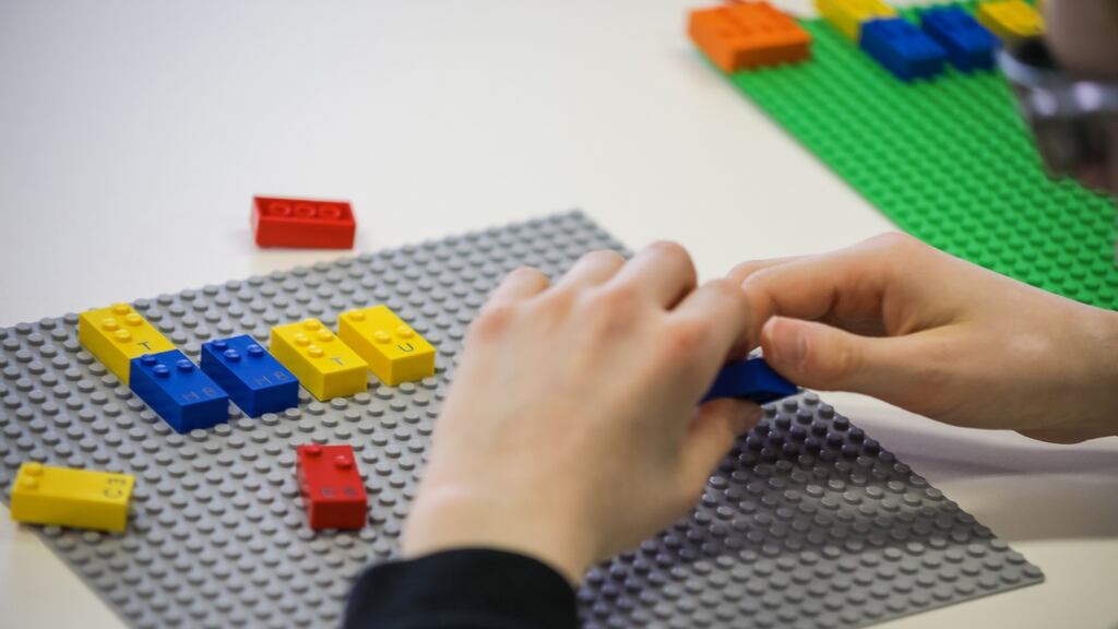 An undated handout image provided by Lego shows Lego bricks featuring the shapes of Braille dots and the corresponding letter, number or punctuation symbol. Photograph: Lego via The New York Times