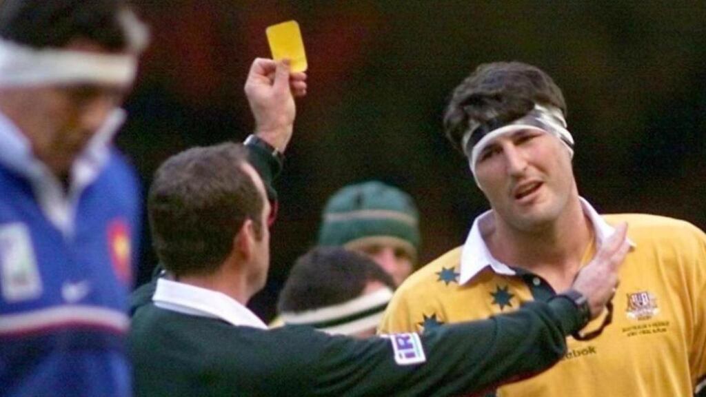 Australian captain John Eales talks to South African referee Andre Watson after receiving a yellow card during the Rugby World Cup 1999 final against France at the Millennium Stadium in Cardiff. Photograph: William West/AFP/Getty