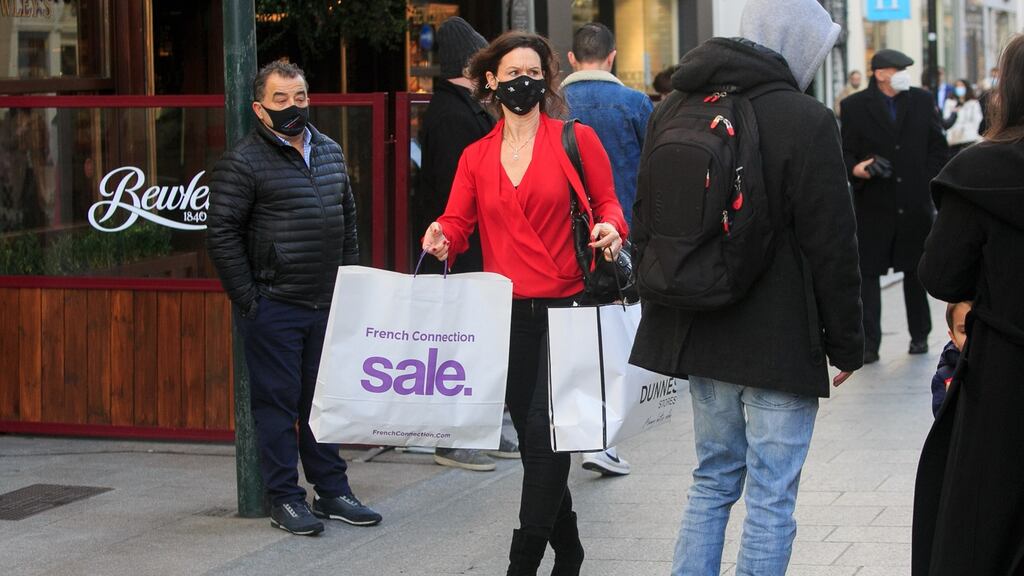 Christmas shoppers on Grafton Street during the Covid 19 pandemic. Pent-up consumer demand is expected to help boost Irish economic growth next year, according to Ibec’s latest economic forecasts. Photograph: Gareth Chaney/Collins