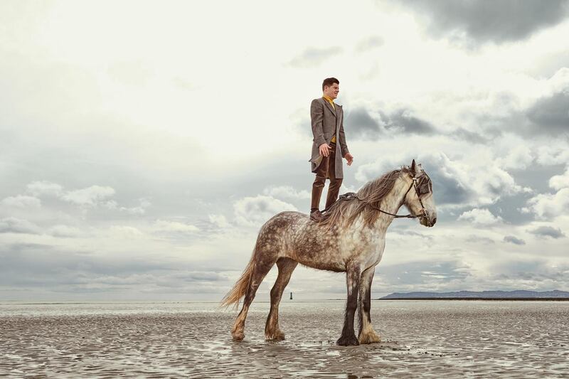Paul Smith Collection: fly-front herringbone wool coat with velvet collar and roll-neck sweater. Photograph: James Mooney
