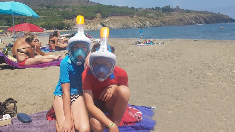 Holly and Milo Garry sporting their Decathlon snorkels, swimwear and microfibre towel in France