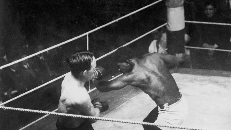 Mike McTigue fighting Battling Siki at the La Scala Theatre in 1923. McTigue won by decision after a 20-round contest.
