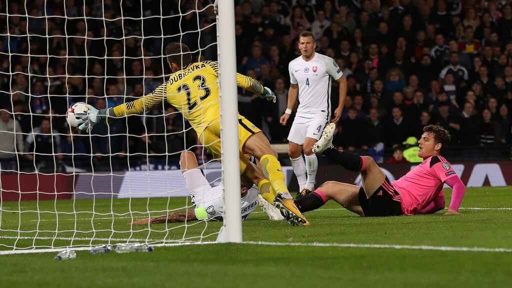 Chris Martin of Scotland scores during the 2018 World Cup Qualifier between Scotland and Slovakia at Hampden Park in Glasgow, Scotland. Photo: Ian MacNicol/Getty Images