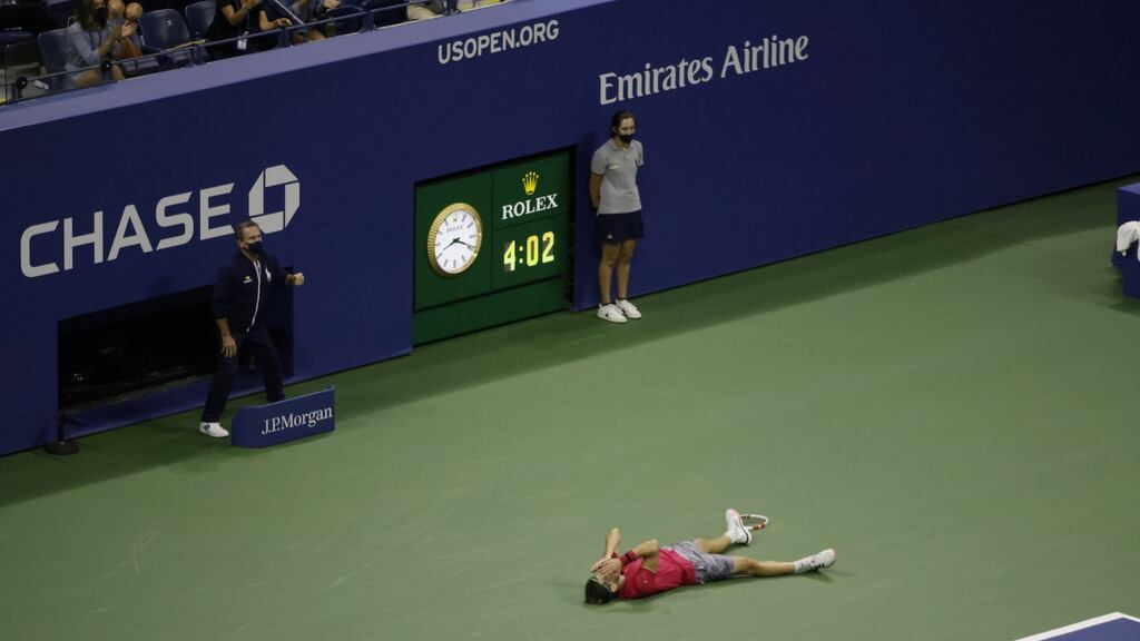 Dominic Thiem on the ground after his US Open final win over Alexander Zverev. Photograph: Jason Szenes/EPA