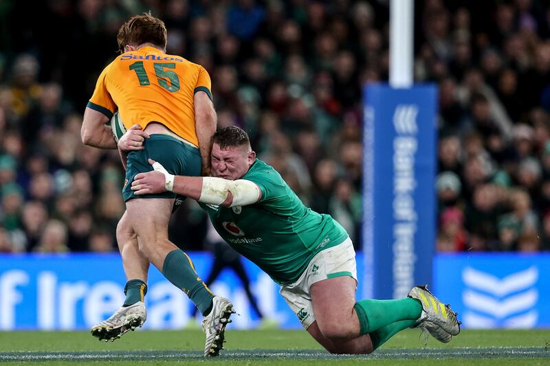 Australia's Andrew Kellaway is tackled by Tadhg Furlong. Photograph: Ben Brady/Inpho