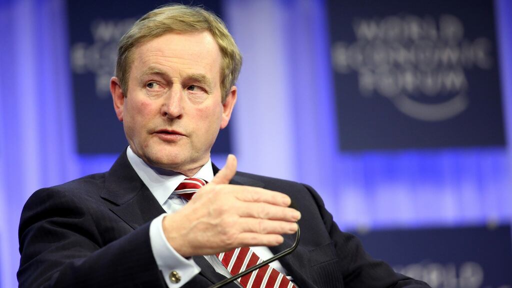 Enda Kenny said he would not take criticism on the economy from Fianna Fáil, who “drove our country off an economic cliff”.   Photograph: Chris Ratcliffe/Bloomberg