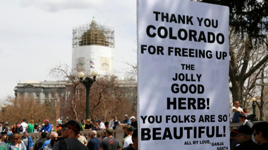 A sign at the 4/20 holiday in Civic Center Park in downtown Denver. Photograph: Rick Wilking/Reuters