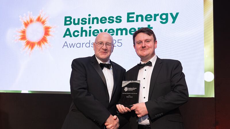 Michael Conlon, awards judge, presents the best energy achievement in food & beverage to Shane Kennedy, Bulmer's Ireland