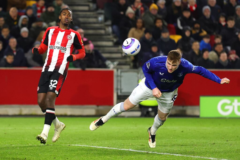 Jake O'Brien of Everton scores his team's first goal under pressure from Paris Maghoma of Brentford. Photograph: Richard Heathcote/Getty