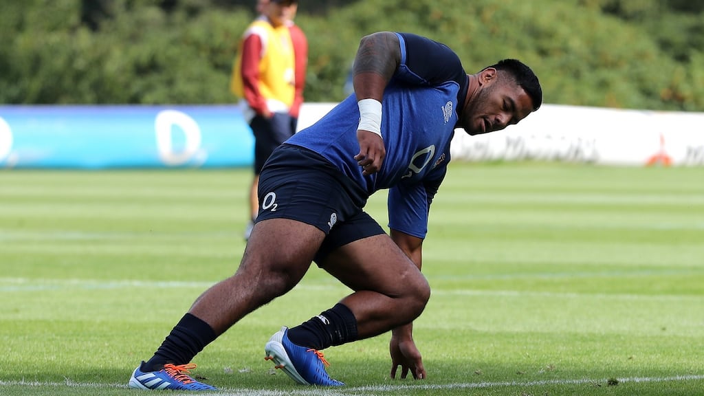 Manu Tuilagi warms up during an England training session at Pennyhill Park. Photograph: Getty Images