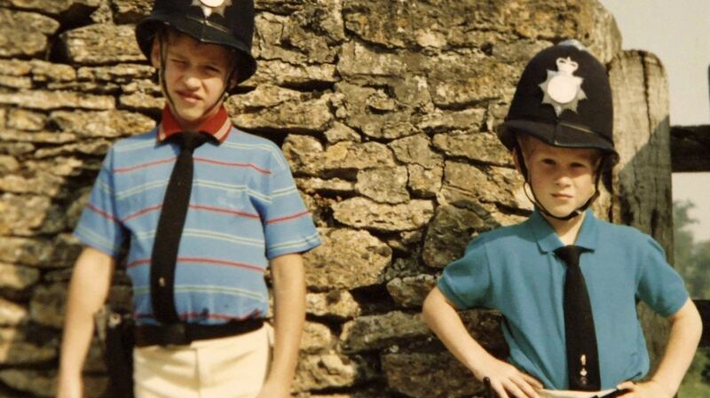 Prince William (left) and Prince Harry in borrowed policemen outfits, from the documentary Diana, Our Mother: Her Life and Legacy