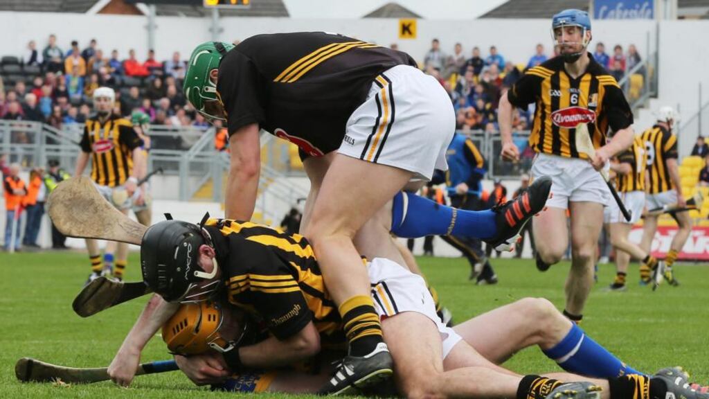 Kilkenny’s JJ Delaney and Tipperary’s Lar Corbett get involved in an off-the-ball incident during Sunday’s final. Photograph: Inpho