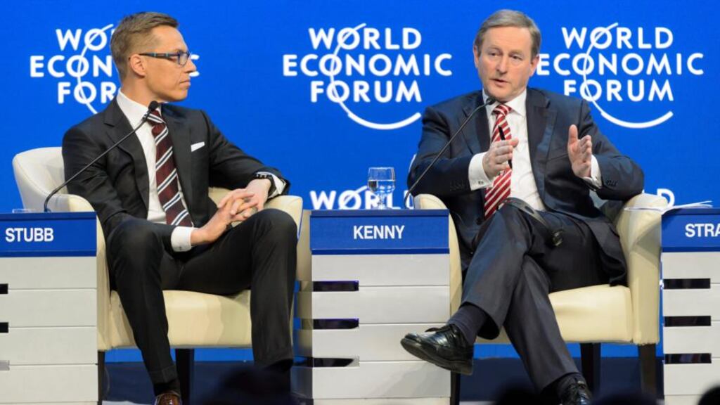 Enda Kenny speaks next to Alexander Stubb, prime minister of Finland, during ap panel session of the World Economic Forum in Davos. Photograph: EPA