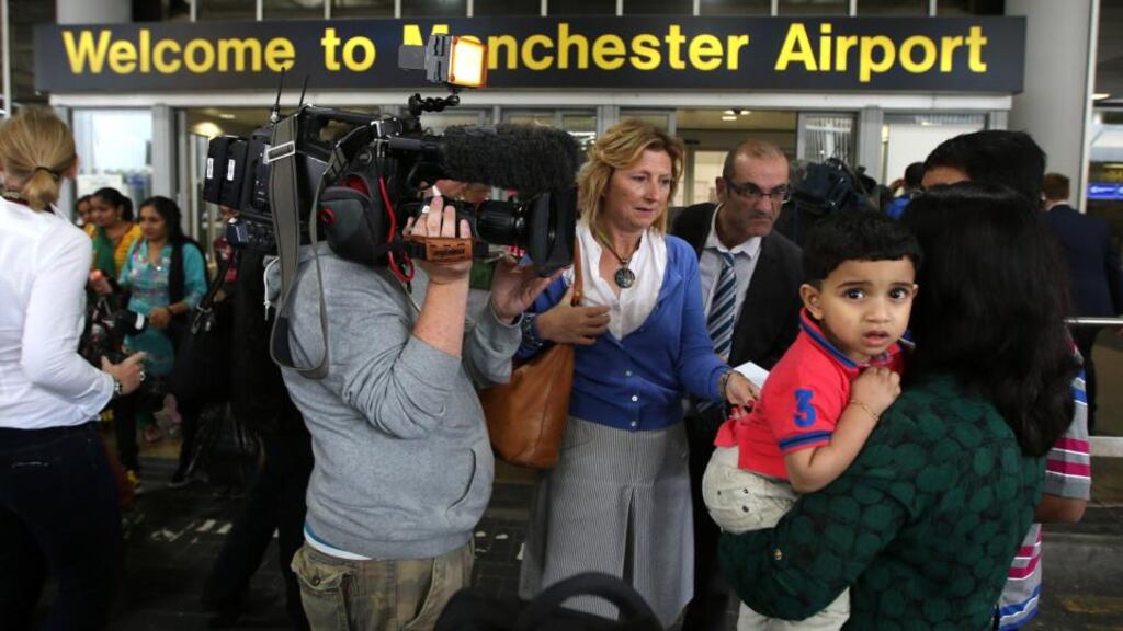 Passengers of the Qatar Airways flight from Doha are interviewed after their plane had a military escort into Manchester Airport. Photograph: Jan Kruger/Getty Images