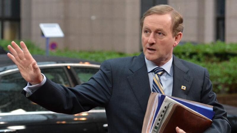 Taoiseach Enda Kenny arrives at a European Union leaders summit in Brussels today. Mr Kenny said he would prefer if cabinet members did not air their views on Garda Commissioner Martin Callinan’s comments about whistleblowers in public. Photograph: Stephanie Lecocq/EPA.