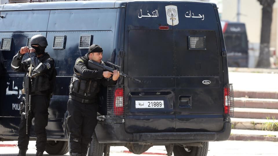 Members of the Tunisian security services take up a position outside the National Bardo Museum. Photograph: Mohamed Messara/EPA
