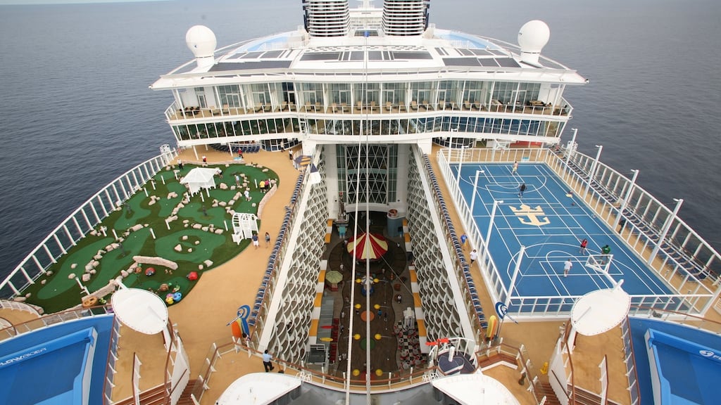 View from the galley of Royal Caribbean International’s Oasis of the Seas funnel showing golf and basket ball pitch.