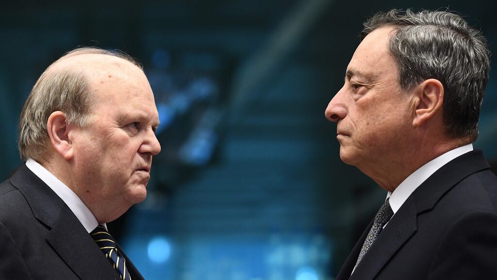 Michael Noonan and European Central Bank president Mario Draghi. File photograph: Emmanuel Dunand/AFP/Getty Images