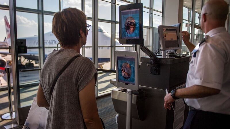 A woman boarding a SAS flight goes through facial recognition verification system, at Dulles airport in Virginia. Photograph: Jim Watson/AFP/Getty Images