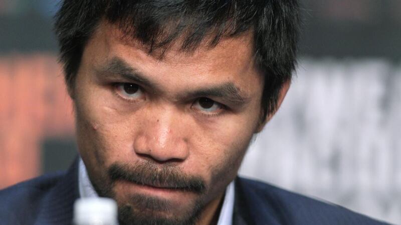 WBO welterweight champion Manny Pacquiao has not knocked out an opponent since 2009 but claims to be revitalised. Photograph: John Gurzinski/AFP/Getty Images