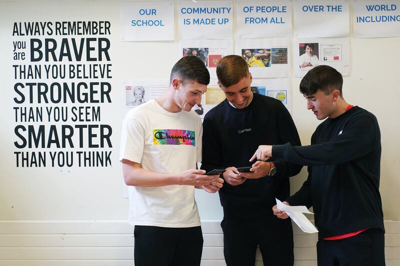 Students at Beneavin De La Salle College, Finglas, checking their Leaving Cert results. Photograph: Brian Lawless/PA Wire