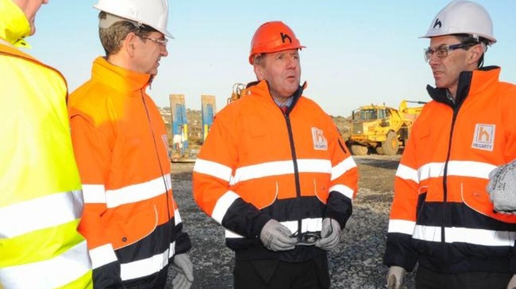 Minister for the Marine Michael Creed (second right) visiting the East Tip works site at Haulbowline Island last December. Photograph: Department of the Marine