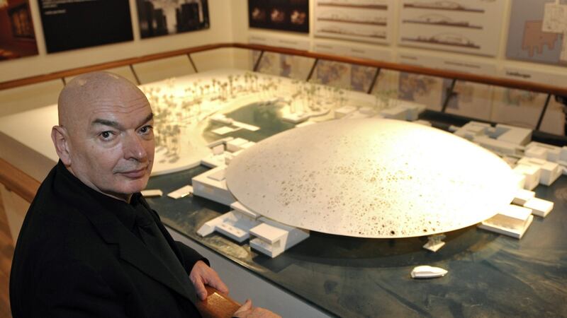 French architect Jean Nouvel with a model of the Abu Dhabi Louvre museum. Photograph: Philippe Wojazer/AFP/Getty Images