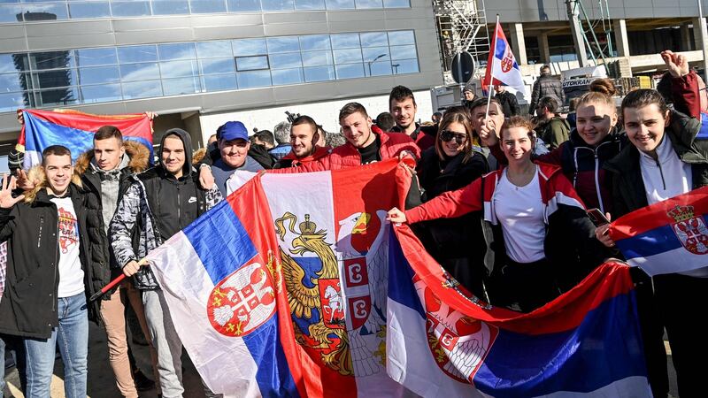 Supporters await Novak Djokovic’s arrival following his deportation from Australia. Photograph: Andrej Isakovic/Getty/AFP