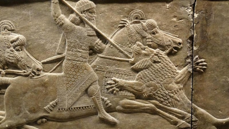 A relief from Nineveh, North Palace, Iraq, showing king Ashurbanipal driving his spear into a lion’s mouth. Photograph: Photo 12/Universal Images Group via Getty Images
