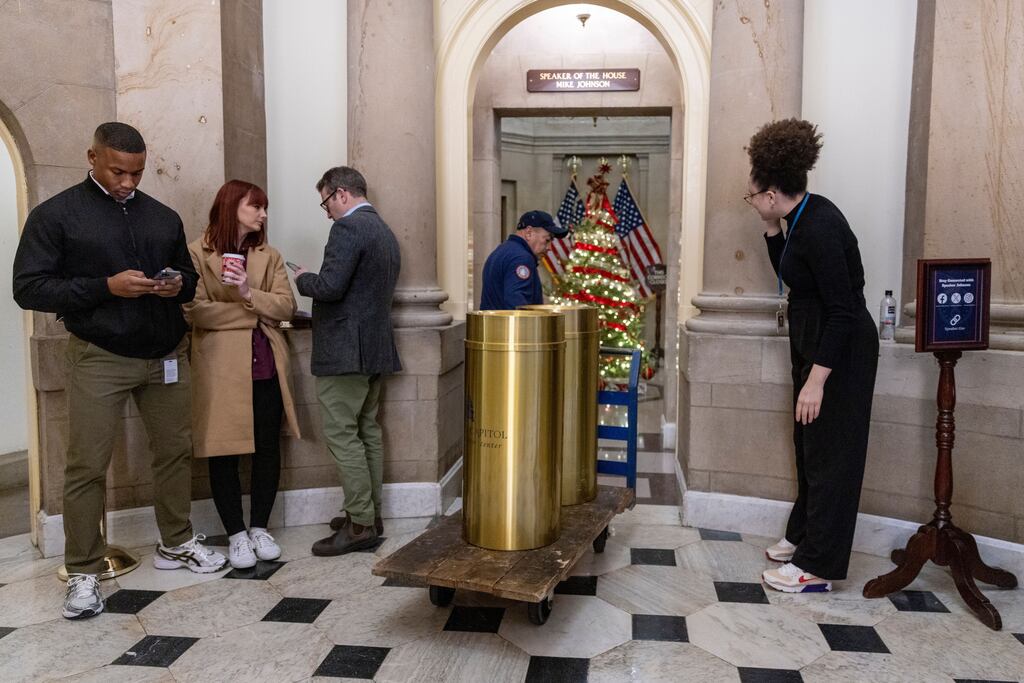 Members of the media wait outside House speaker Mike Johnson's office in the US Capitol in Washington, DC. Photograph: EPA