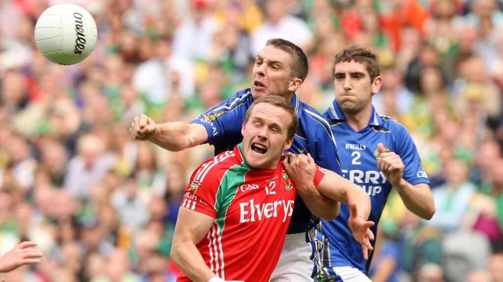 Mayo’s Andy Moran in action against Kerry’s Marc Ó Sé, the latter is one of the Kingdom’s few decorated stars from their victorious era. Photo: Ryan Byrne/Inpho