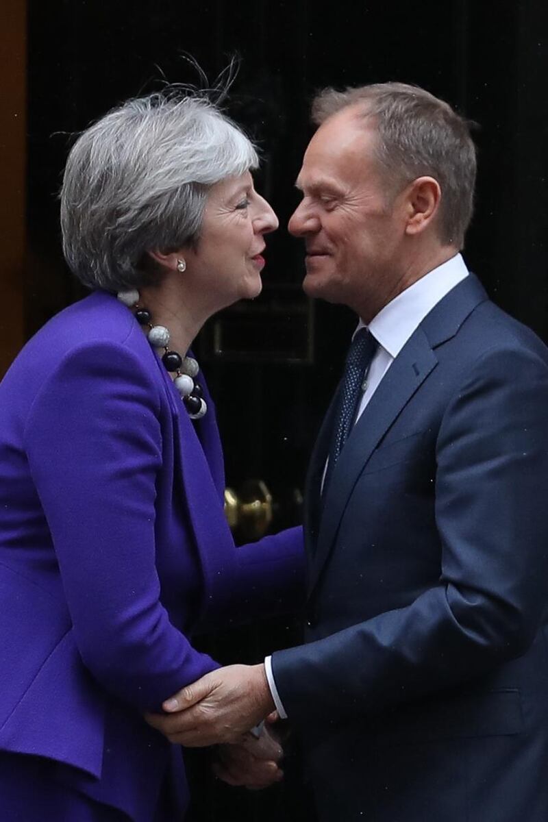 Britain’s Prime Minister Theresa May (L) greets European Council President Donald Tusk at 10 Downing street in central London on March 1, 2018. / AFP PHOTO / Daniel LEAL-OLIVASDANIEL LEAL-OLIVAS/AFP/Getty Images